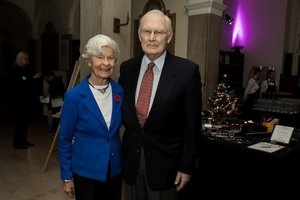 Sue Elliott and Marshall Wansbrough by the toy train he donated and assembled for the silent auction 